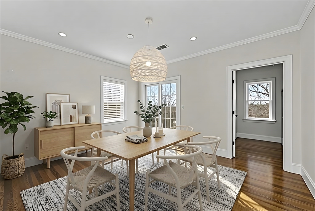 72-74 Manthorne Road, Unit 74 Boston, MA 02132 - Photo 9 of 22 a view of a dining room with furniture window and wooden floor