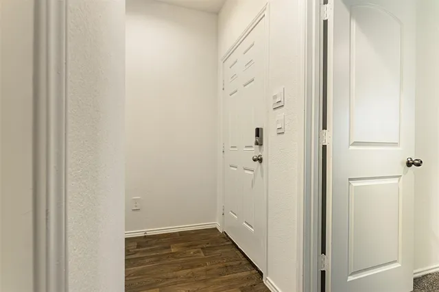 a view of a bathroom from the hallway