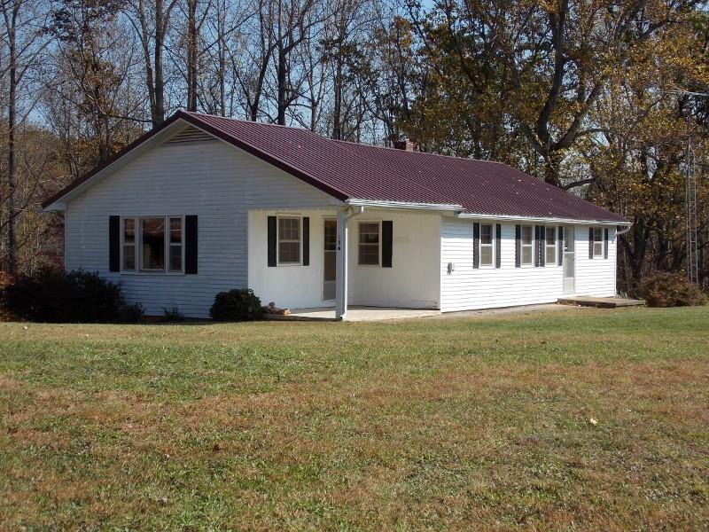 156 Rose Wood Road Woolwine, VA 24185 - Photo 3 of 29 front view of a house with a yard