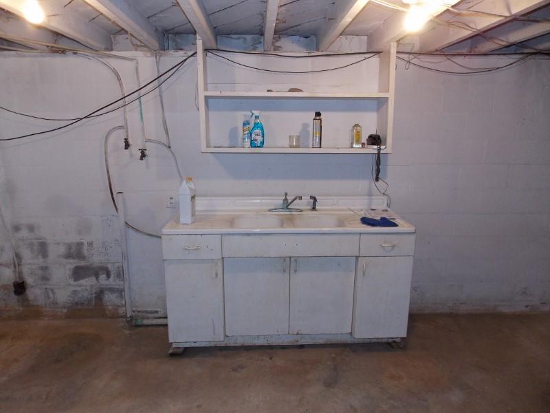 156 Rose Wood Road Woolwine, VA 24185 - Photo 22 of 29 a bathroom with a sink and a mirror