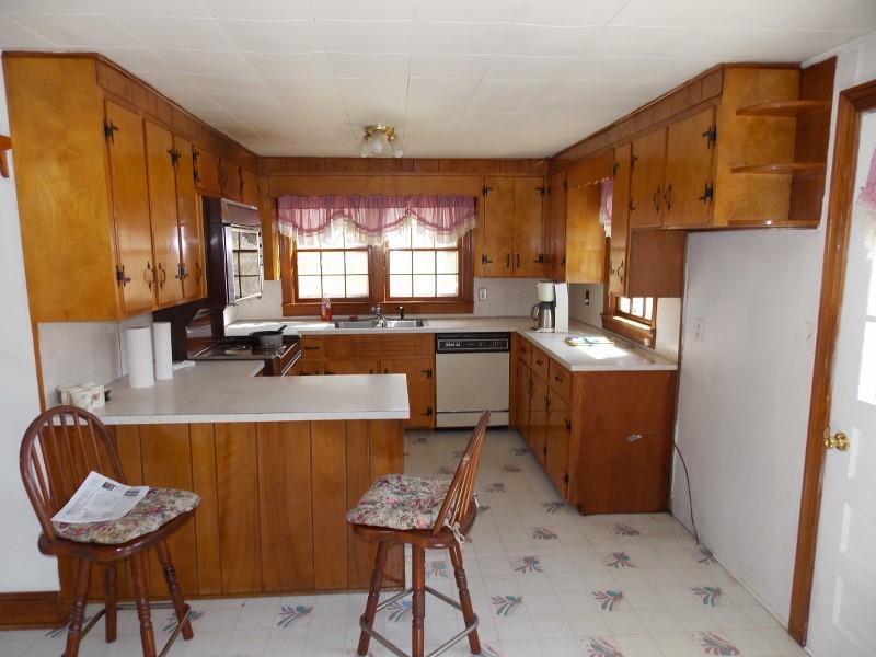 156 Rose Wood Road Woolwine, VA 24185 - Photo 25 of 29 a kitchen with a sink cabinets and window