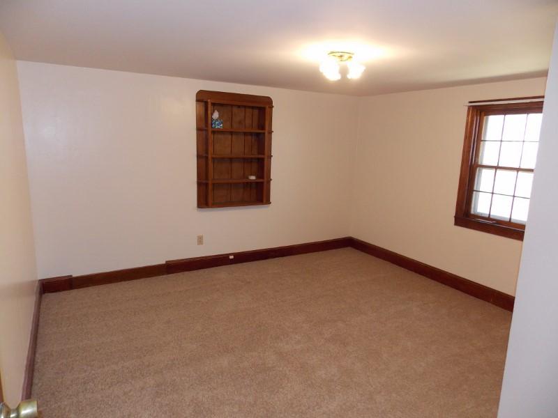 156 Rose Wood Road Woolwine, VA 24185 - Photo 29 of 29 an empty room with windows