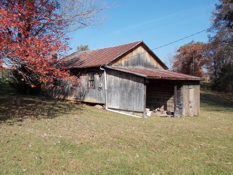 156 Rose Wood Road Woolwine, VA 24185 - Photo 4 of 29 a view of a house with yard and garage