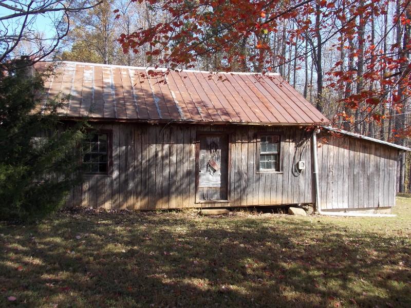 156 Rose Wood Road Woolwine, VA 24185 - Photo 5 of 29 a view of backyard with small cabin