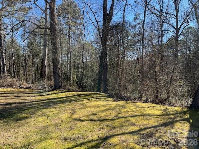 3155 Frederick Place Granite Falls, NC 28630 - Photo 14 of 15 a view of swimming pool and trees in the background