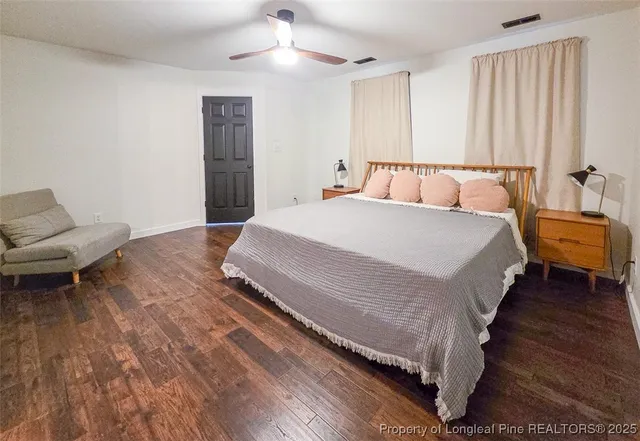 a room with a washing machine and a sink