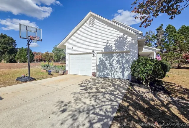 a view of a swimming pool and outdoor seating