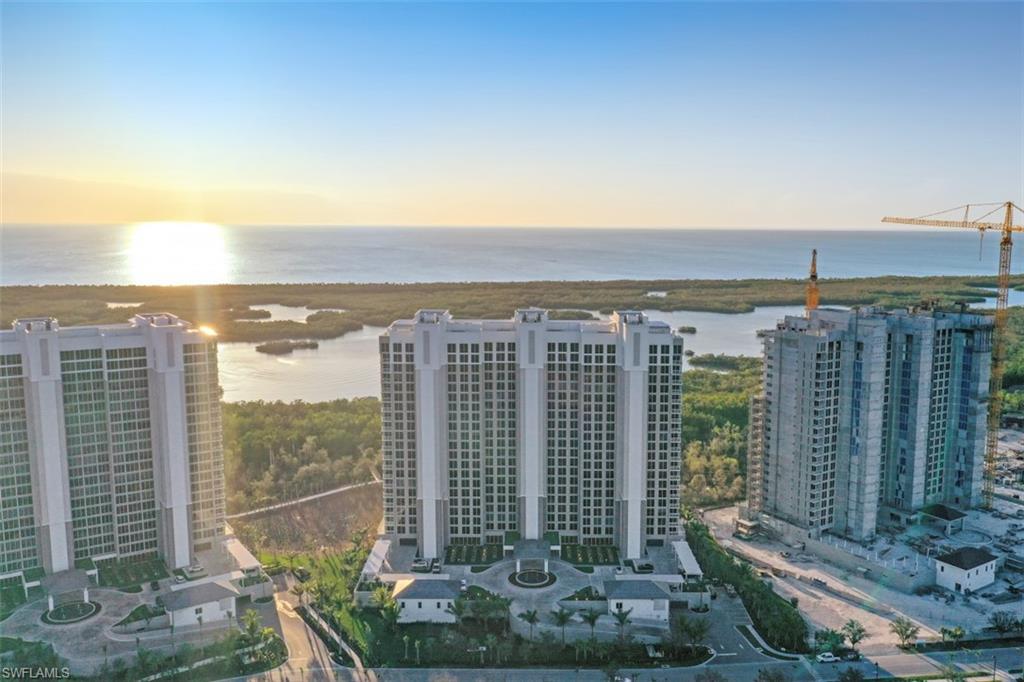 13935 Old Coast Road, Unit 1703 Naples, FL 34110 - Photo 37 of 44 a view of a city with tall buildings