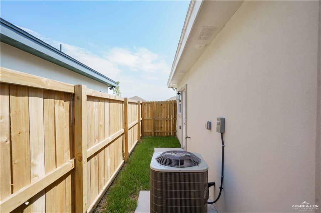 5900 Puffin Avenue, Unit 2 Mission, TX 78573 - Photo 19 of 32 a front view of a house with a yard