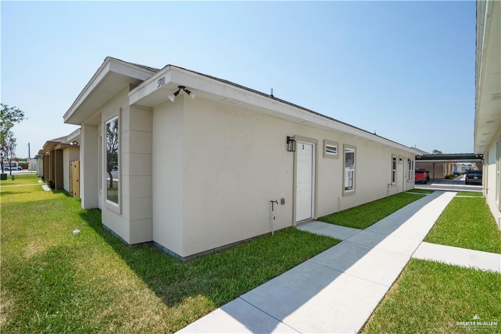 5900 Puffin Avenue, Unit 2 Mission, TX 78573 - Photo 22 of 32 a view of a house with a yard