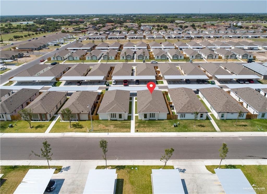 5900 Puffin Avenue, Unit 2 Mission, TX 78573 - Photo 28 of 32 an aerial view of residential houses with outdoor space