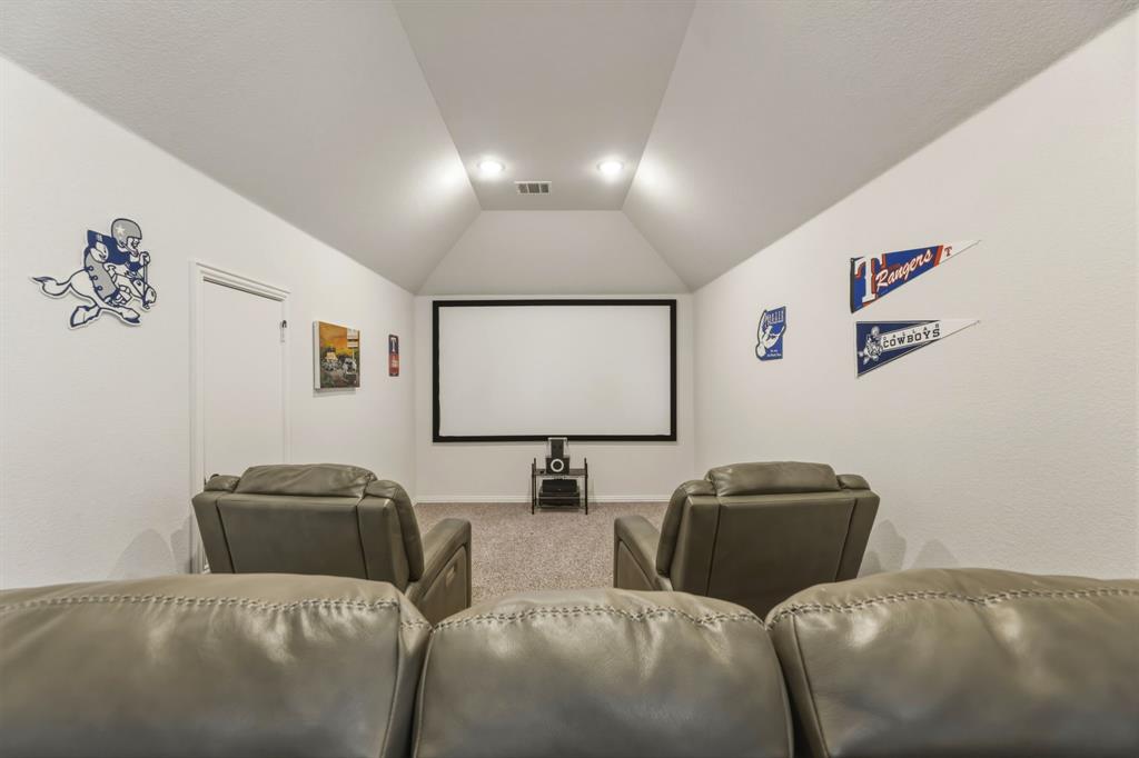 1030 Timber Ridge Drive Justin, TX 76247 - Photo 27 of 40 Cinema with carpet and baseboards