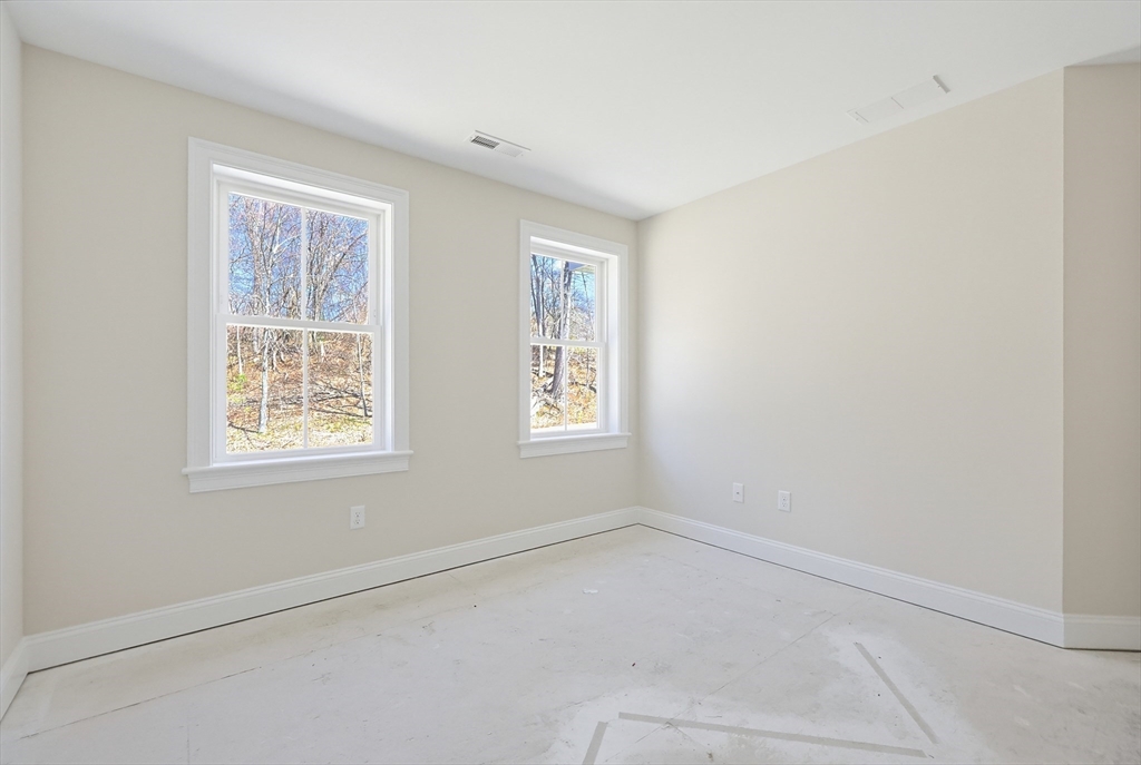 112 West Meadow Road Townsend, MA 01474 - Photo 26 of 38 an empty room with a window
