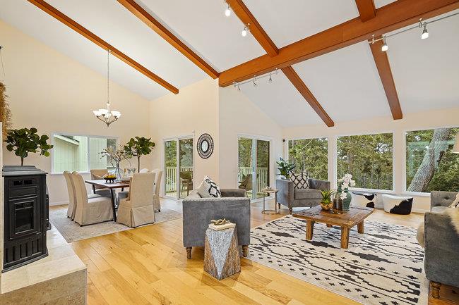 4076 Crest Road Pebble Beach, CA 93953 - Photo 11 of 46 a living room with fireplace furniture and a large window