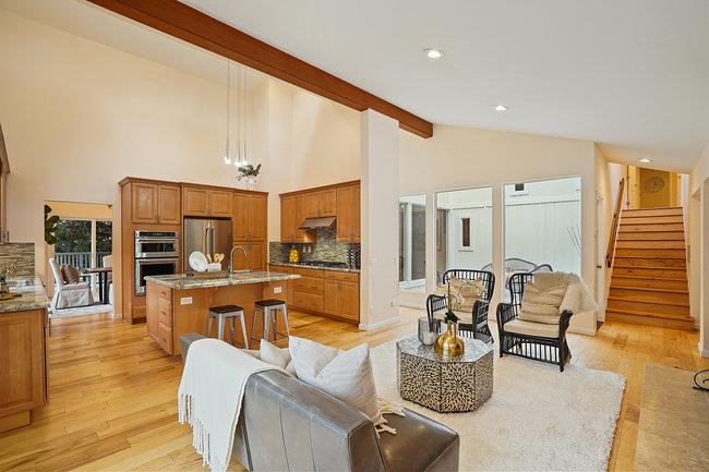 4076 Crest Road Pebble Beach, CA 93953 - Photo 17 of 46 a living room with furniture kitchen view and a large window