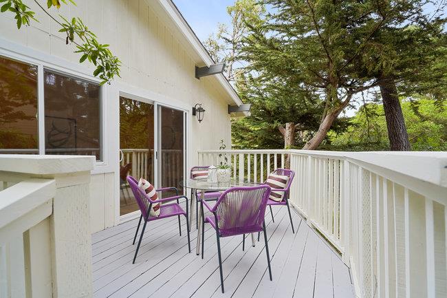 4076 Crest Road Pebble Beach, CA 93953 - Photo 30 of 46 a view of a chair and tables in the balcony