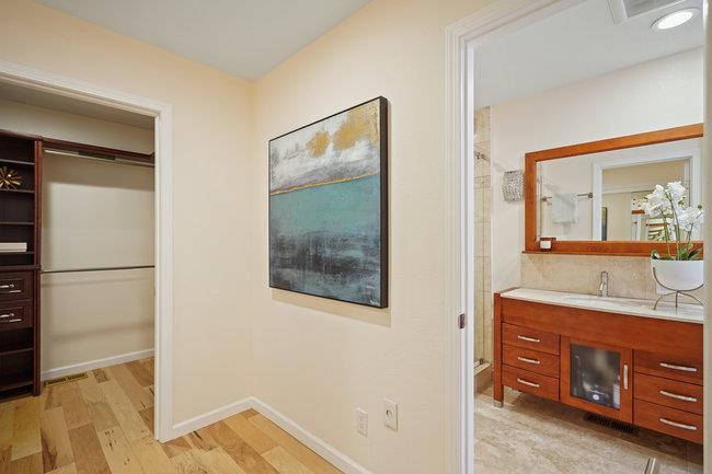 4076 Crest Road Pebble Beach, CA 93953 - Photo 33 of 46 a spacious bathroom with a double vanity sink and a mirror