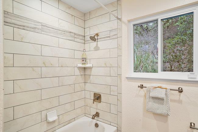 4076 Crest Road Pebble Beach, CA 93953 - Photo 38 of 46 a bathroom with a shower
