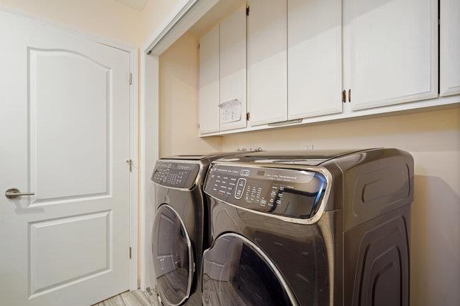 4076 Crest Road Pebble Beach, CA 93953 - Photo 39 of 46 a utility room with dryer and washer