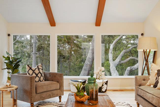 4076 Crest Road Pebble Beach, CA 93953 - Photo 10 of 46 a living room with furniture and a large window