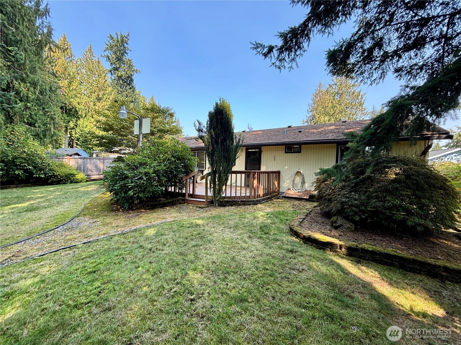 19304 3rd Drive Southeast Bothell, WA 98012 - Photo 13 of 24 a front view of a house with garden