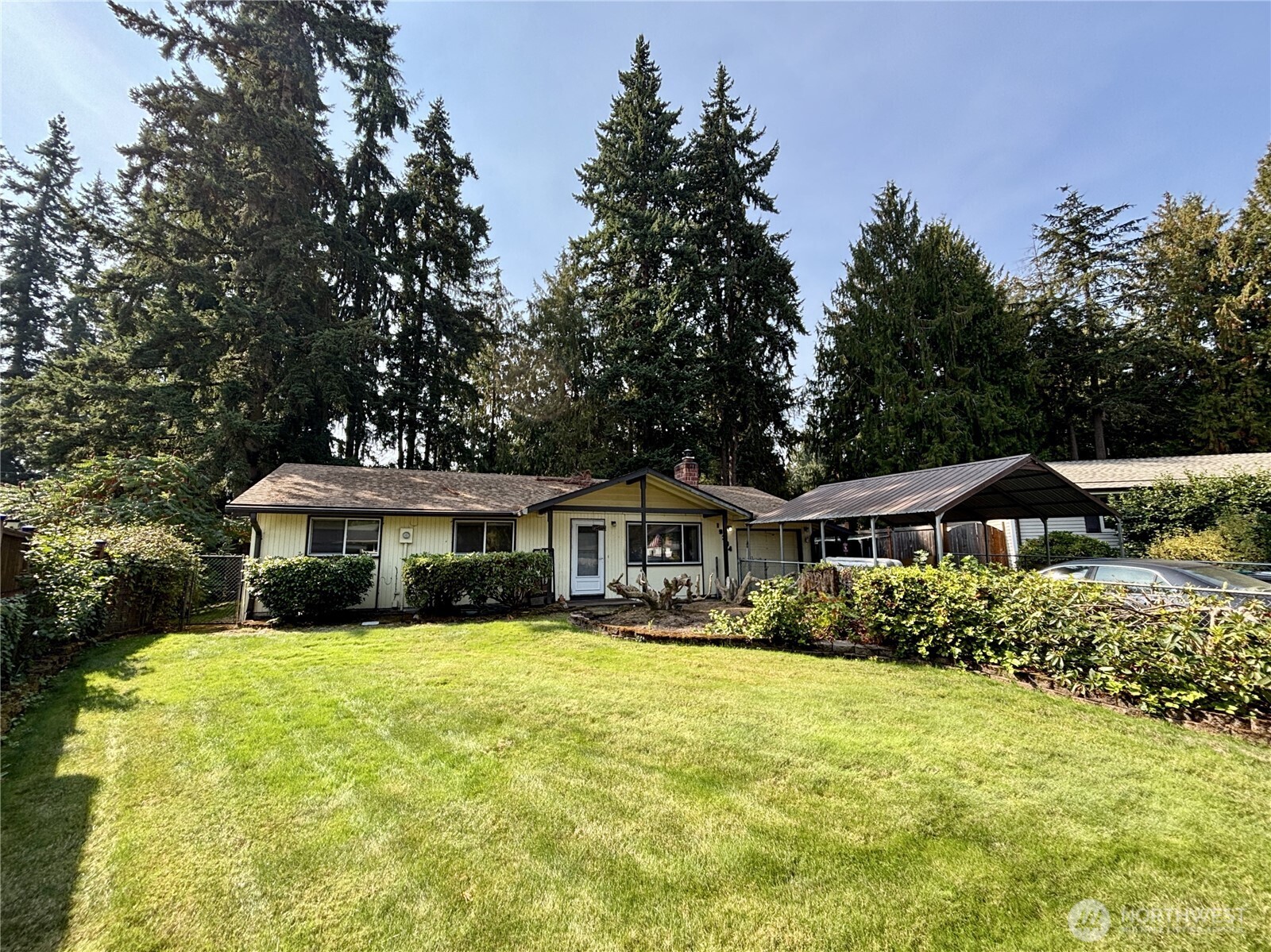 19304 3rd Drive Southeast Bothell, WA 98012 - Photo 2 of 24 a front view of a house with a yard