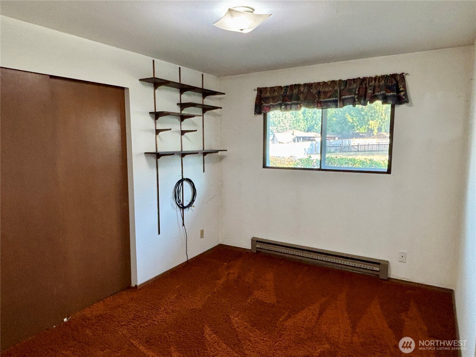 19304 3rd Drive Southeast Bothell, WA 98012 - Photo 22 of 24 a view of room with window and air conditioner vent