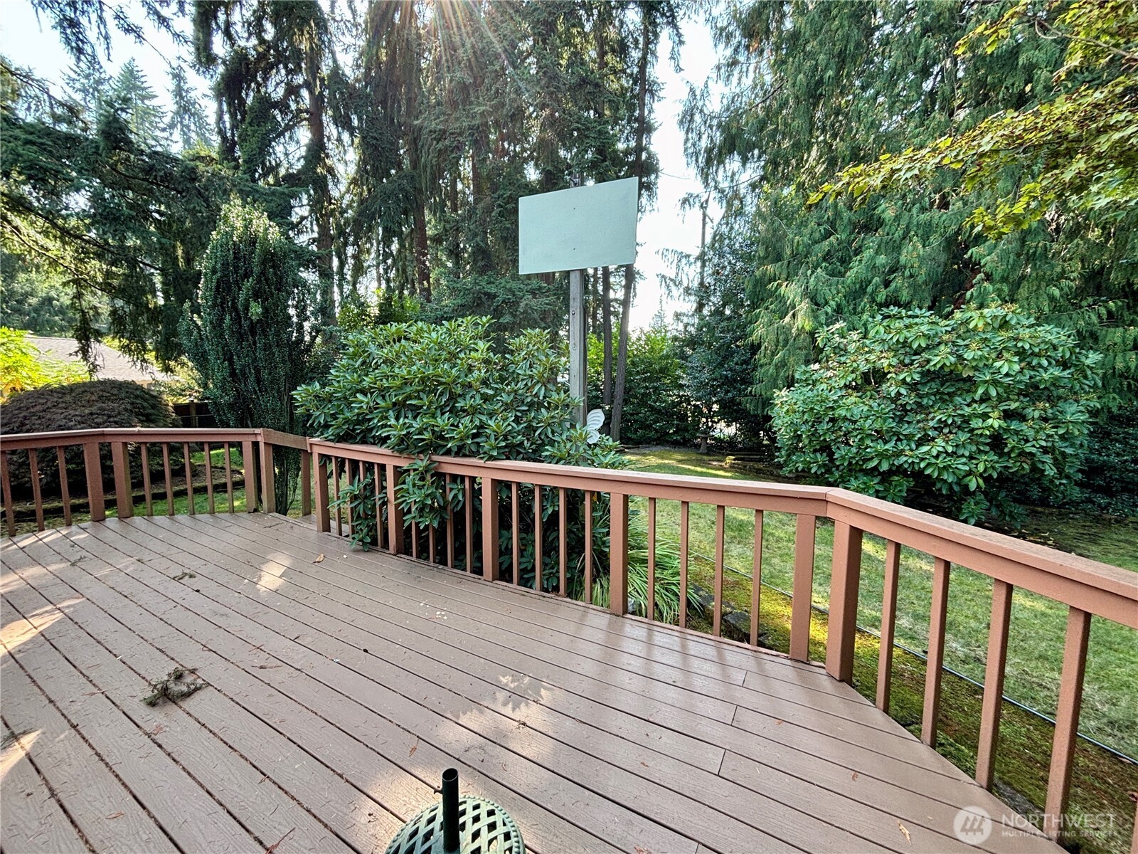 19304 3rd Drive Southeast Bothell, WA 98012 - Photo 4 of 24 a balcony with wooden floor and fence