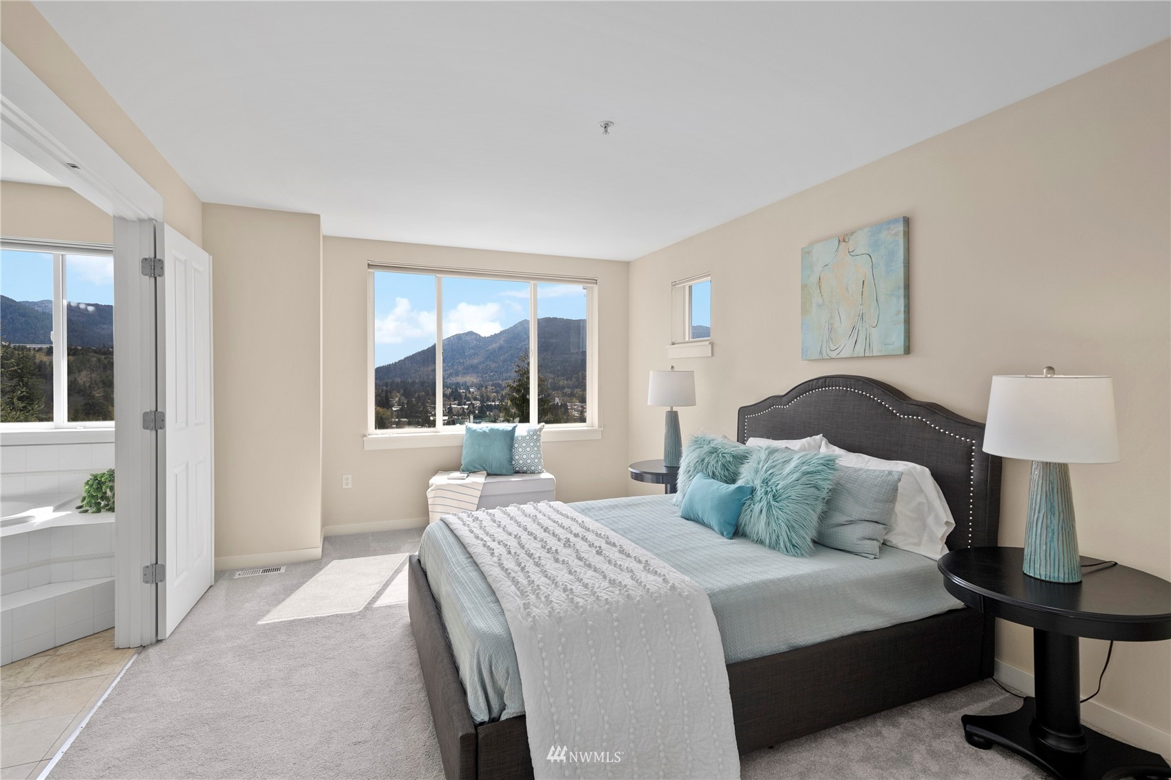 23120 Southeast Black Nugget Road, Unit H1 Issaquah, WA 98029 - Photo 14 of 27 a bedroom with a bed and a window