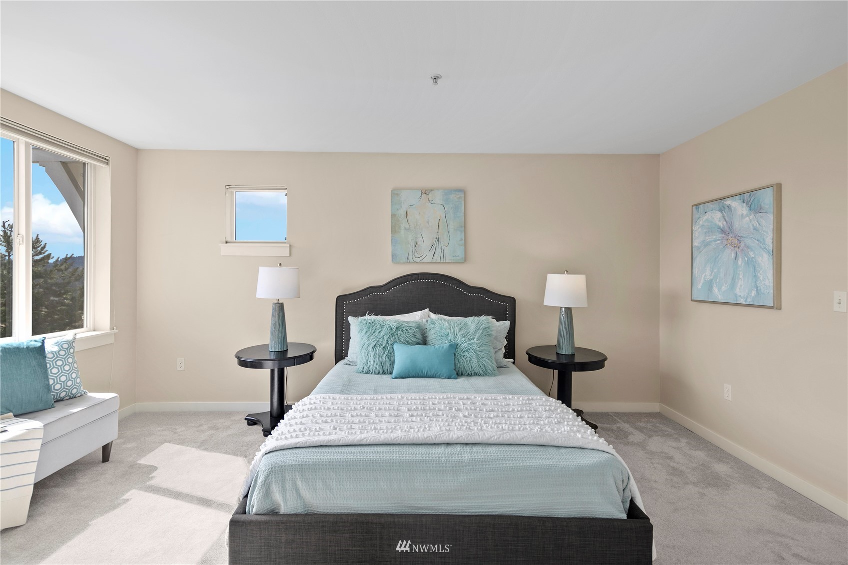 23120 Southeast Black Nugget Road, Unit H1 Issaquah, WA 98029 - Photo 15 of 27 a bedroom with a bed and wooden floor