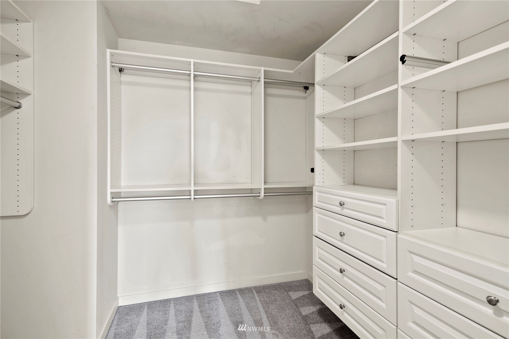 23120 Southeast Black Nugget Road, Unit H1 Issaquah, WA 98029 - Photo 19 of 27 a view of an empty walk in closet