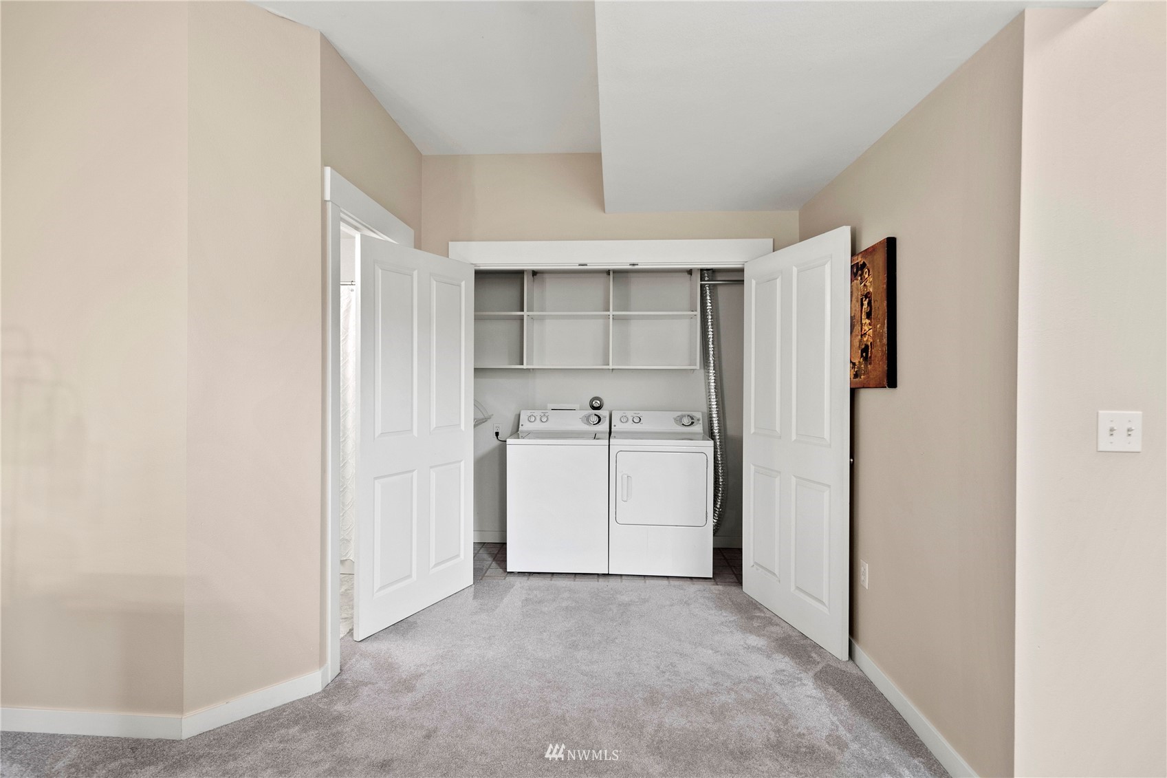23120 Southeast Black Nugget Road, Unit H1 Issaquah, WA 98029 - Photo 27 of 27 a view of a kitchen with a sink and refrigerator
