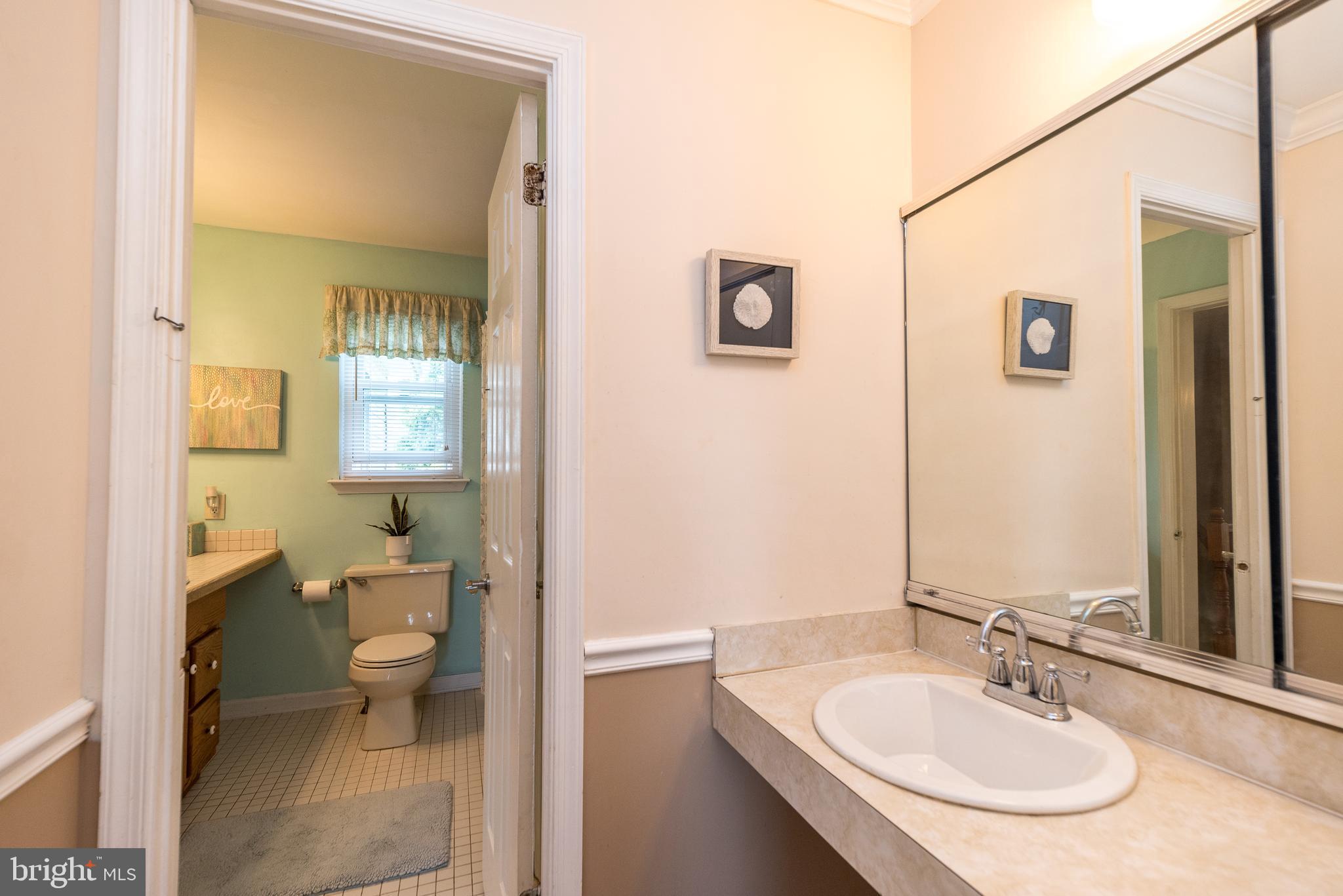 255 Twining Road Lansdale, PA 19446 - Photo 42 of 49 Dressing area in main bedroom with bathroom entry