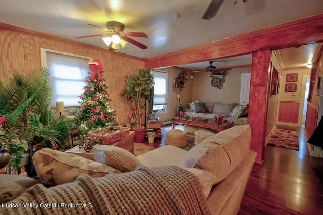 a living room with furniture and a window