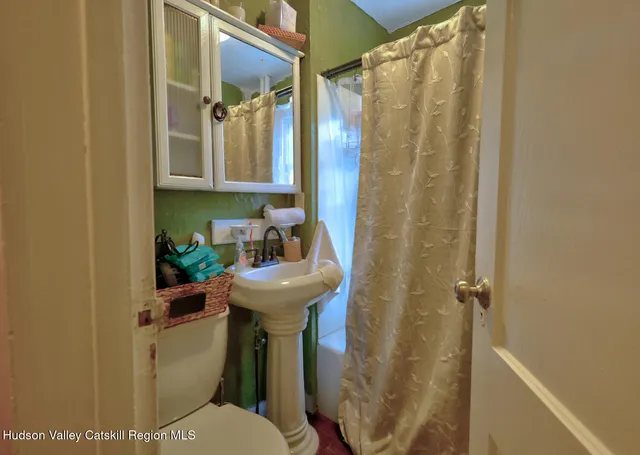 a vase of flowers sitting on a table