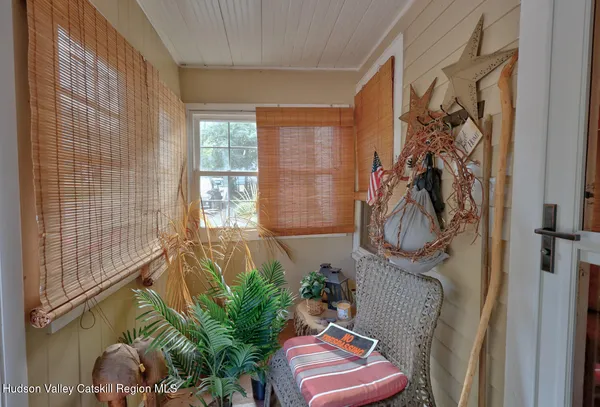 a front view of house with an outdoor space and seating