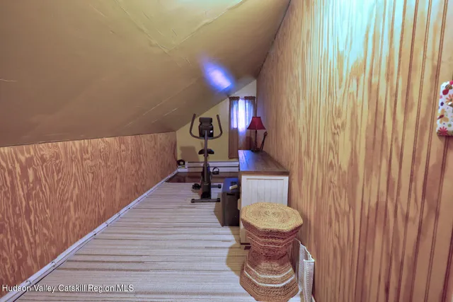 a bathroom with a sink toilet and mirror