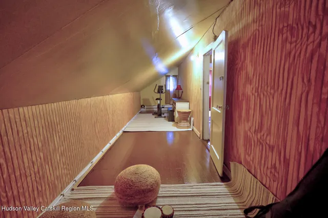 a backyard of a house with outdoor seating