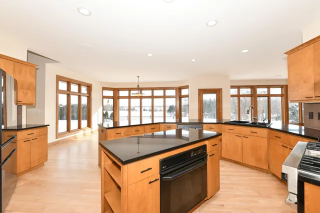 $1,199,999 | 2100 North Oakwoods Court, Summit, WI 53066