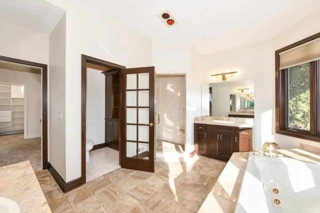 $1,199,999 | 2100 North Oakwoods Court, Summit, WI 53066