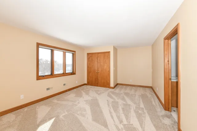 $1,199,999 | 2100 North Oakwoods Court, Summit, WI 53066