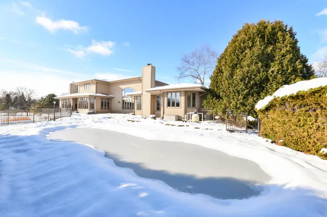 $1,199,999 | 2100 North Oakwoods Court, Summit, WI 53066