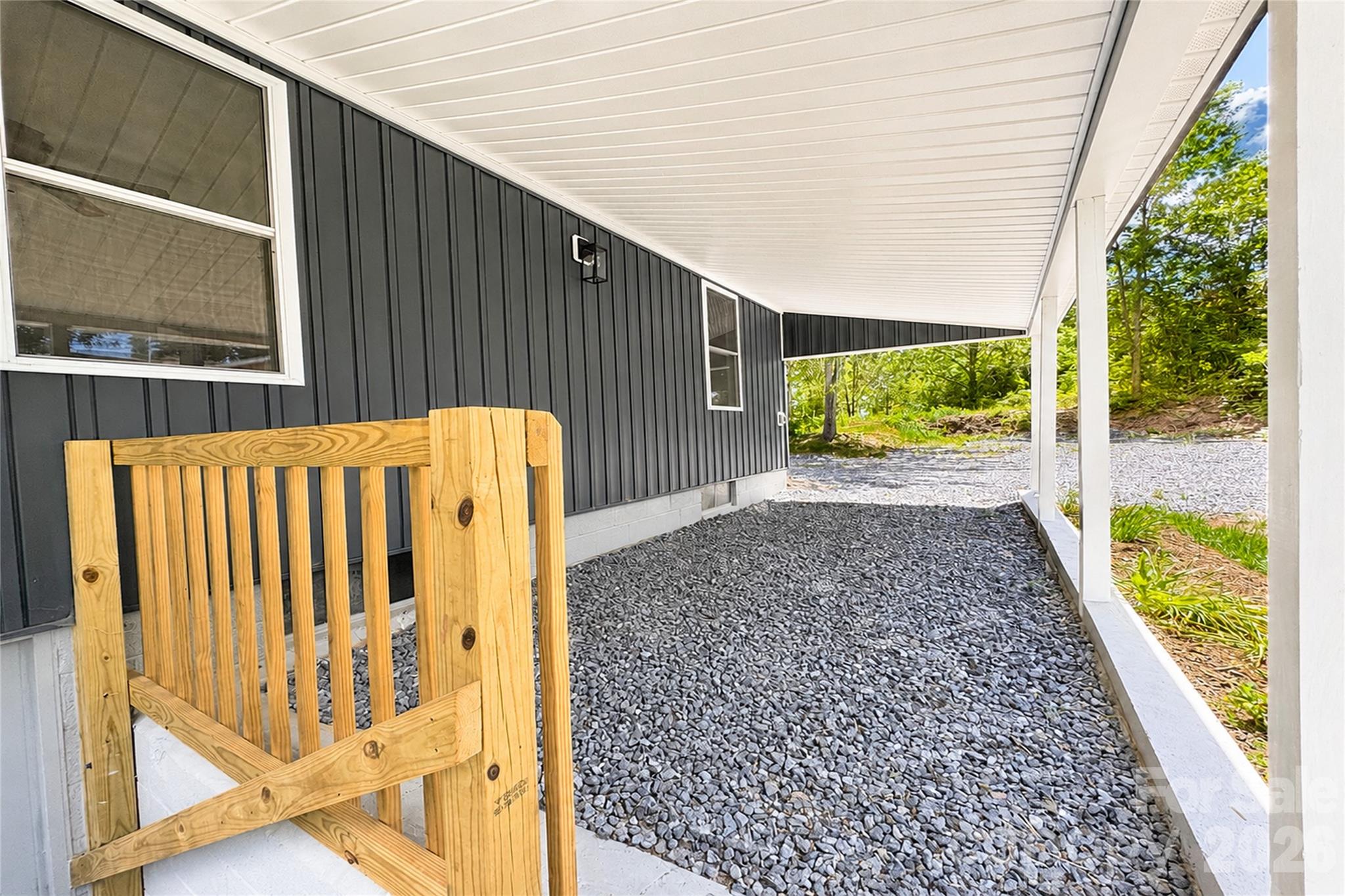 1403 Dudley Shoals Road Granite Falls, NC 28630 - Photo 29 of 34 a view of porch with wooden floor