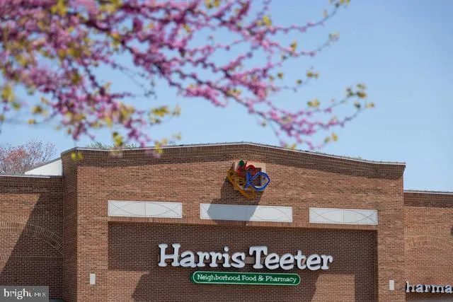 a view of a lake with houses in the back