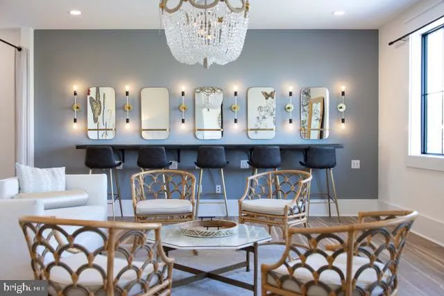 a front view of a house with a lake view