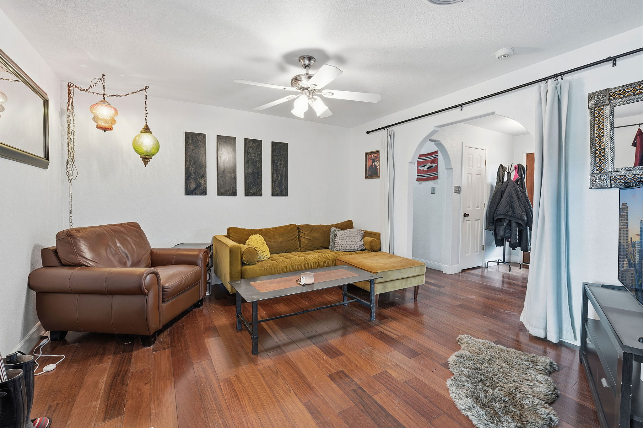 700 Corral Lane Austin, TX 78745 - Photo 11 of 26 a living room with furniture and wooden floor