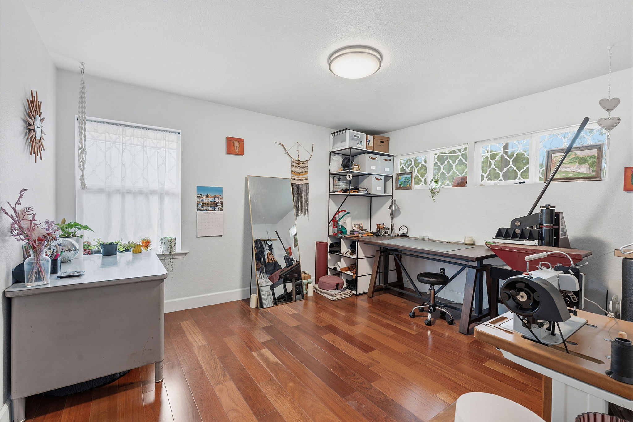 700 Corral Lane Austin, TX 78745 - Photo 15 of 26 a view of a workspace with furniture and a kitchen