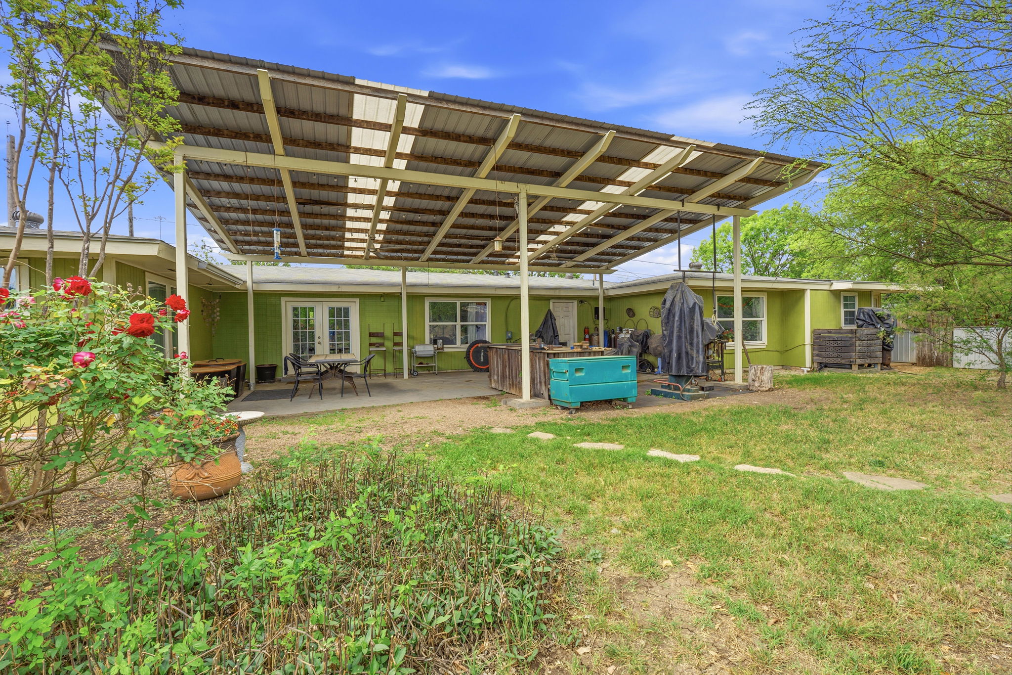 700 Corral Lane Austin, TX 78745 - Photo 22 of 26 a view of a house with a backyard