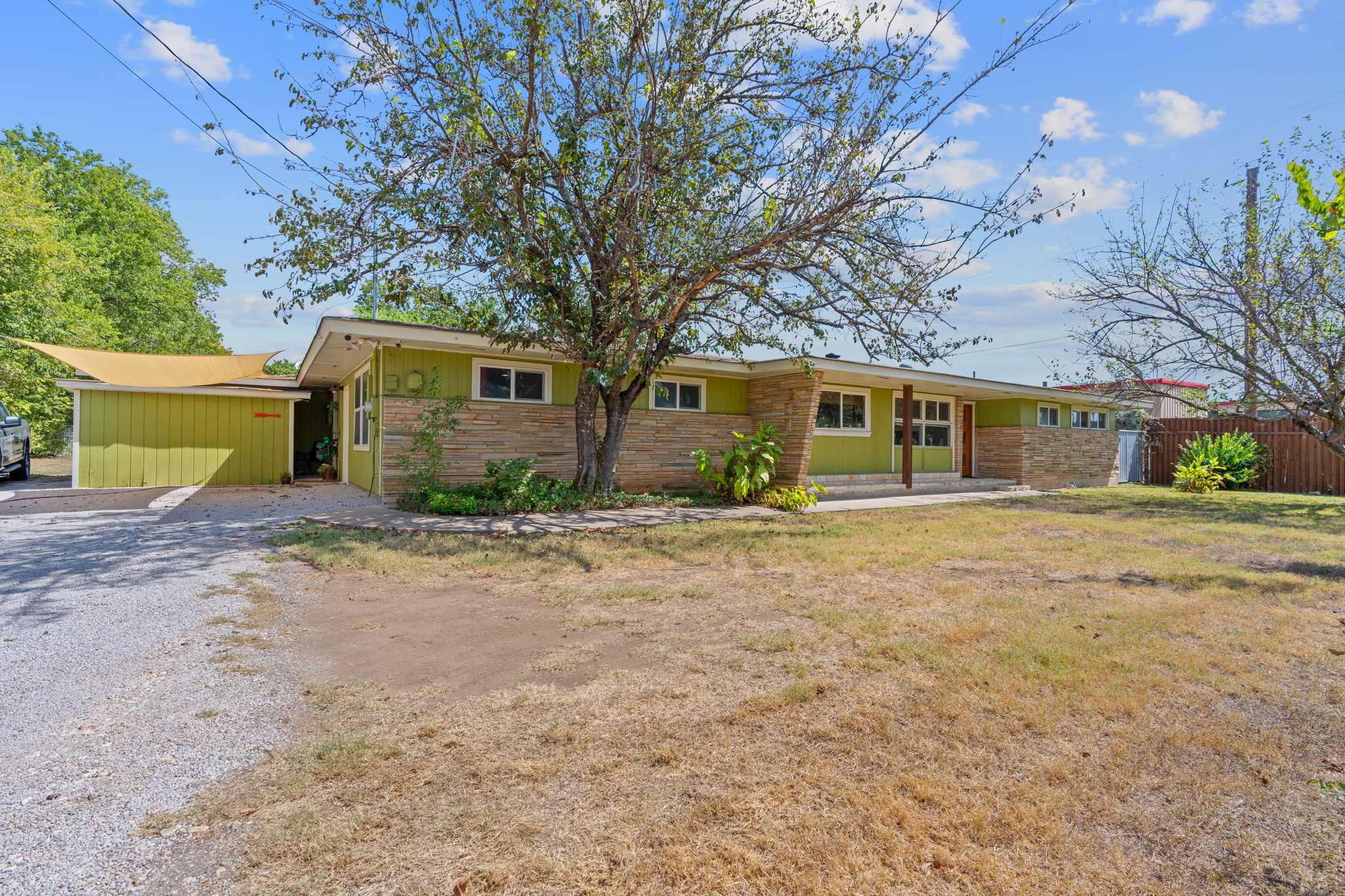 700 Corral Lane Austin, TX 78745 - Photo 26 of 26 front view of a house with a yard