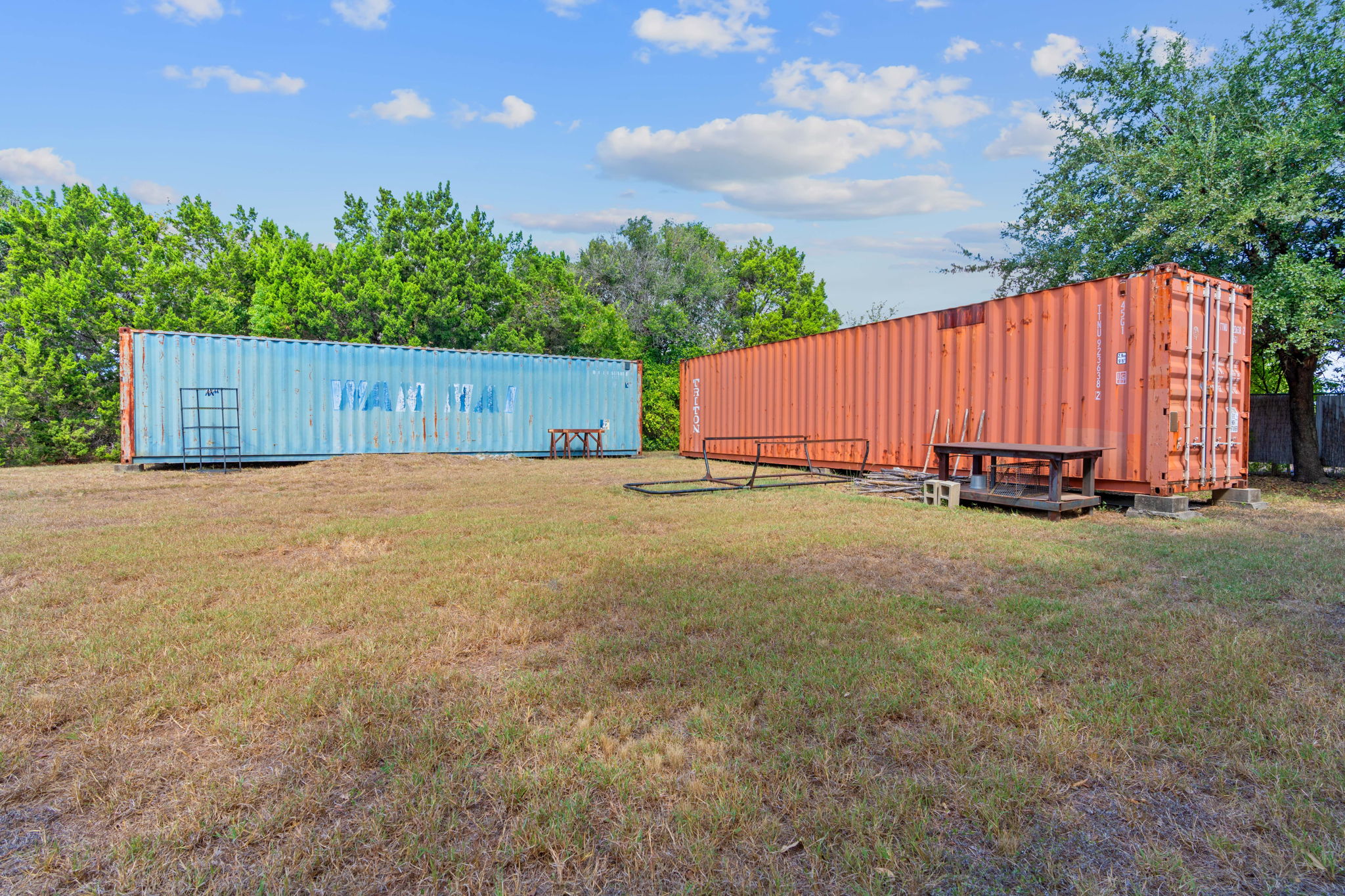 700 Corral Lane Austin, TX 78745 - Photo 3 of 26 a view of a tub with a small yard and a trees